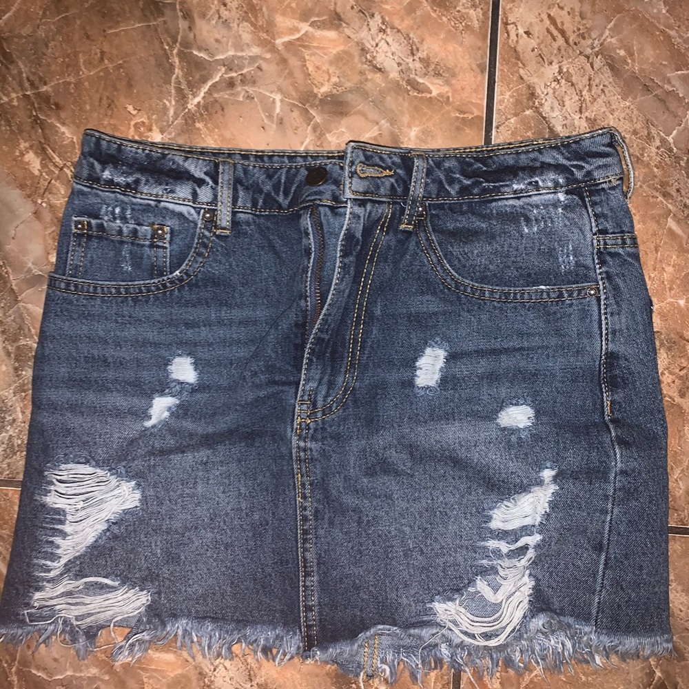 Distressed jean mini skirt